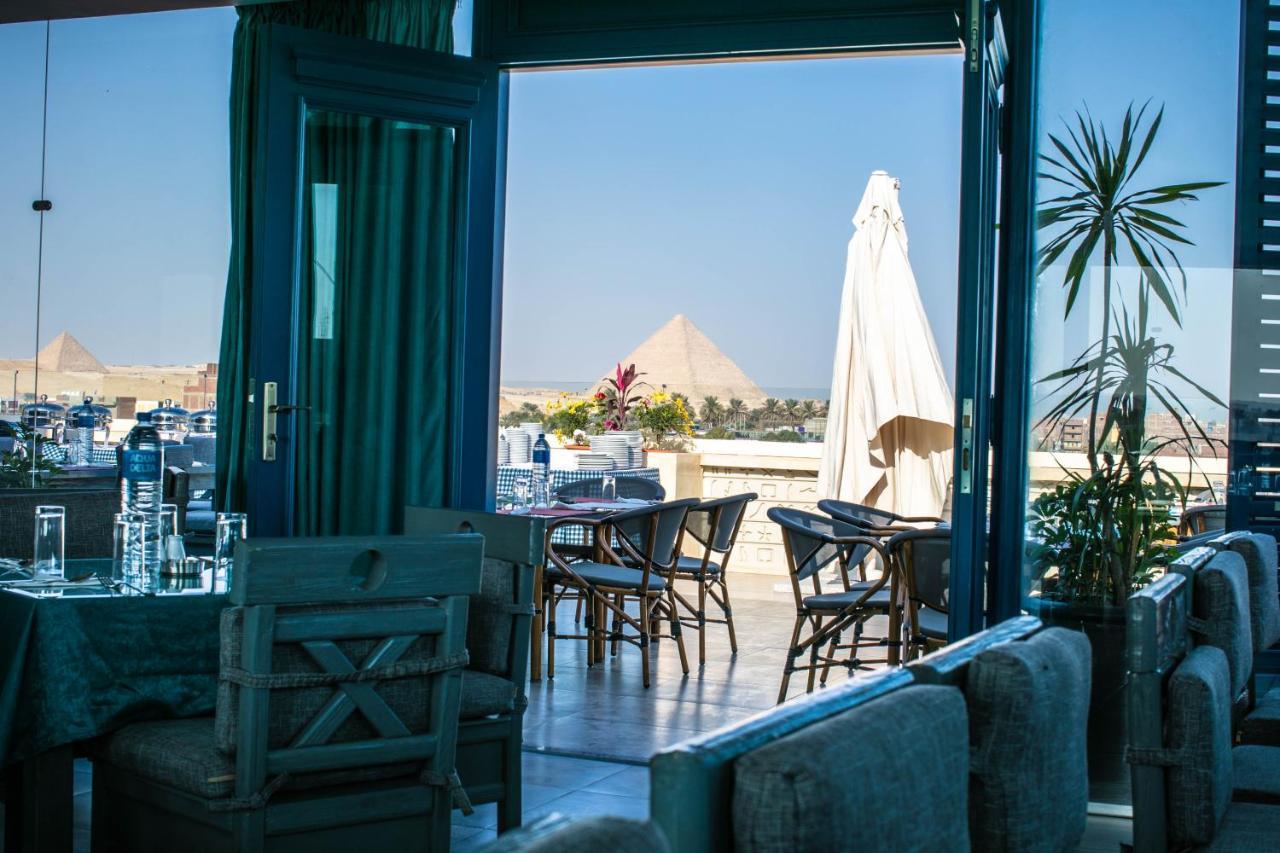 Pyramids Oasis Hotel Kafret el-Gabal Exterior foto