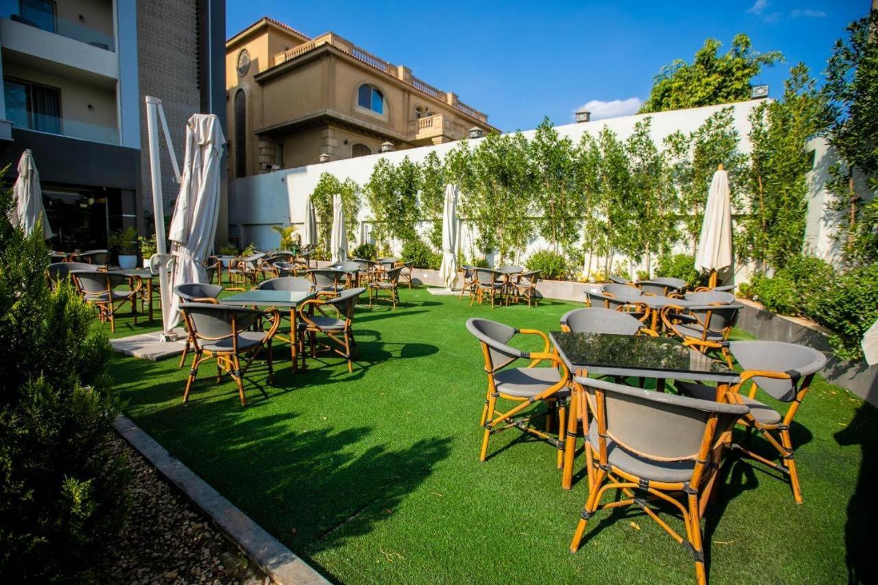 Pyramids Oasis Hotel Kafret el-Gabal Exterior foto